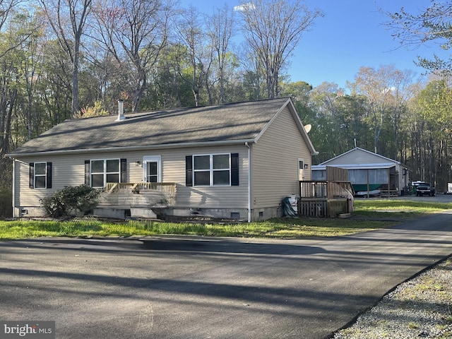 view of front of home featuring crawl space