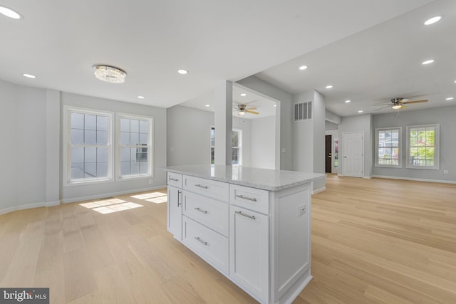 5634 6th St N, Arlington, VA 22205 - kitchen with ceiling fan, open floor plan, light wood finished floors, white cabinetry, and recessed lighting