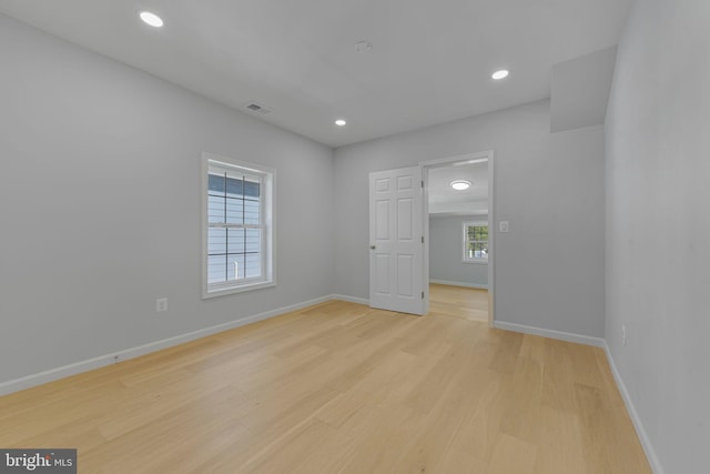 5634 6th St N, Arlington, VA 22205 - empty room with light wood-style floors, baseboards, and recessed lighting