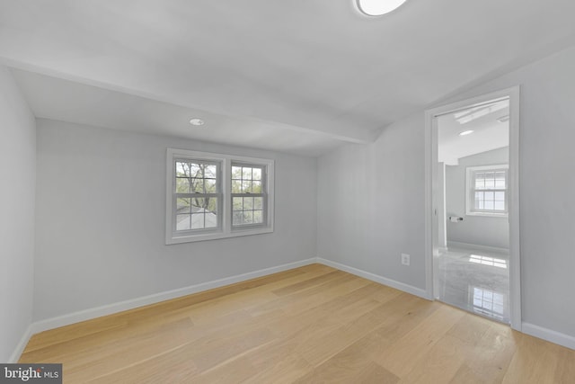 5634 6th St N, Arlington, VA 22205 - bonus room featuring vaulted ceiling, light wood-type flooring, and baseboards
