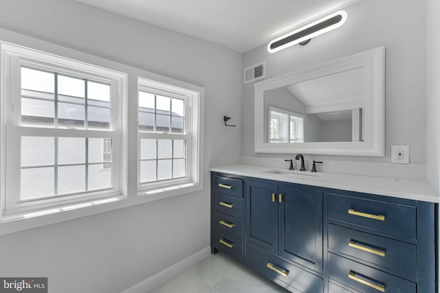 5634 6th St N, Arlington, VA 22205 - bathroom with healthy amount of natural light, vanity, and baseboards