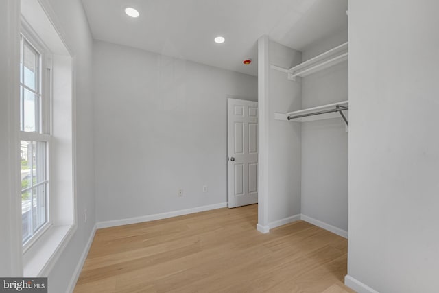 5634 6th St N, Arlington, VA 22205 - unfurnished bedroom with multiple windows, light wood-style flooring, baseboards, and recessed lighting