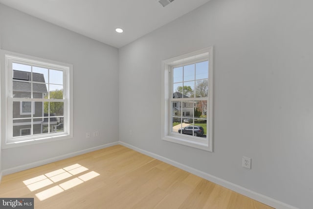 5634 6th St N, Arlington, VA 22205 - spare room with baseboards, wood finished floors, and recessed lighting