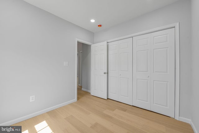 5634 6th St N, Arlington, VA 22205 - unfurnished bedroom featuring light wood finished floors, baseboards, a closet, and recessed lighting