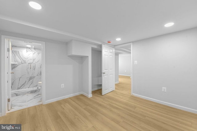 5634 6th St N, Arlington, VA 22205 - finished basement with baseboards, recessed lighting, and light wood-style floors