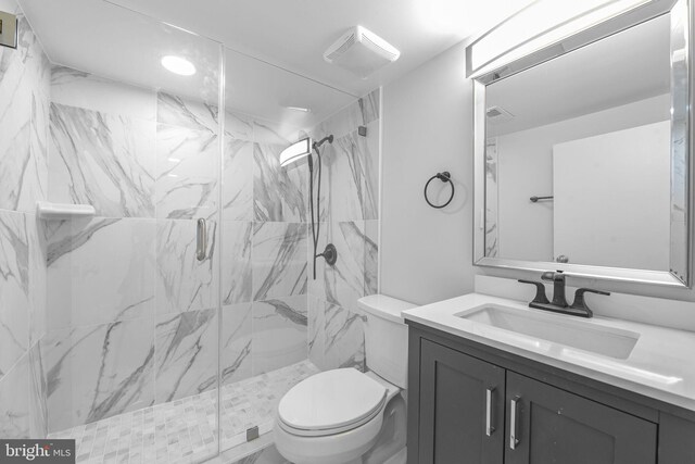 5634 6th St N, Arlington, VA 22205 - full bath with toilet, a marble finish shower, and vanity