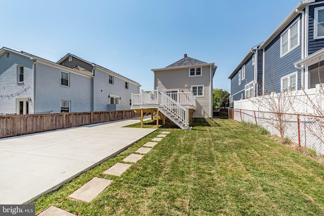5634 6th St N, Arlington, VA 22205 - rear view of house featuring stairs, a deck, a patio area, and a residential view