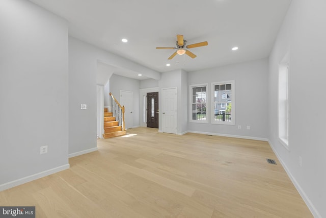 5634 6th St N, Arlington, VA 22205 - unfurnished living room with stairs, ceiling fan, recessed lighting, light wood-type flooring, and baseboards