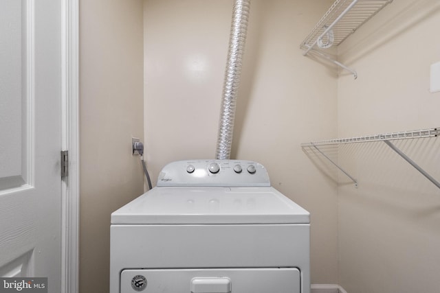 laundry room with washer / dryer and laundry area