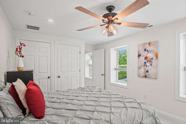 bedroom featuring recessed lighting, baseboards, visible vents, and ceiling fan