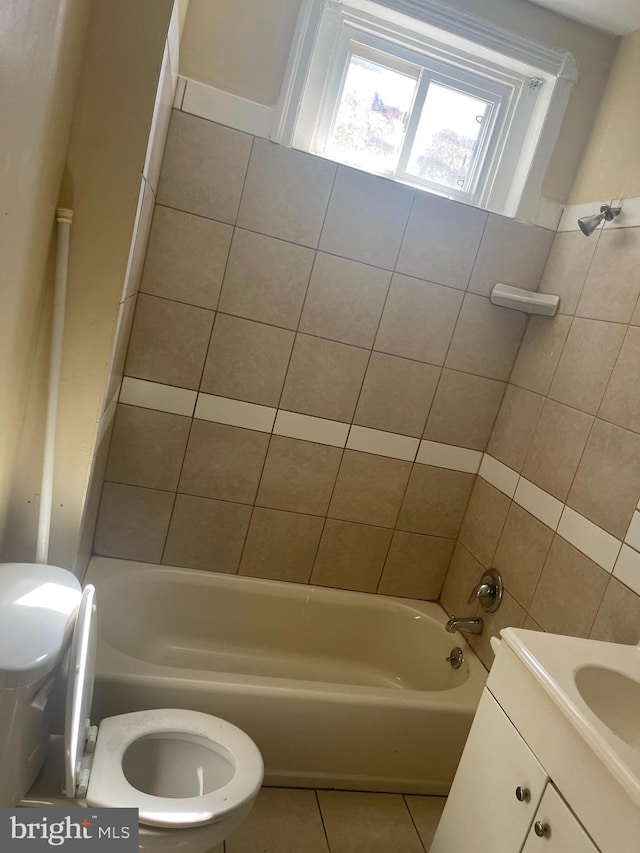 404 N 52nd St, Philadelphia, PA 19139 - full bathroom featuring tile walls, tile patterned floors, and toilet