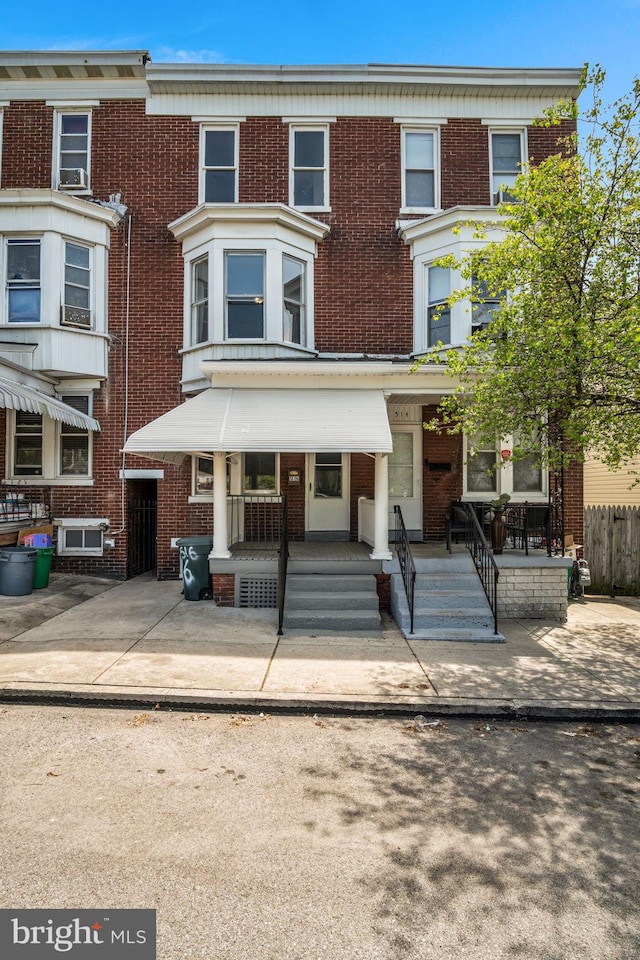 multi unit property featuring brick siding