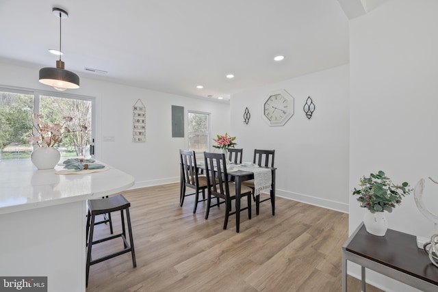 2475 W Denneys Rd, Dover, DE 19904 - dining area featuring electric panel, light wood-type flooring, baseboards, visible vents, and recessed lighting