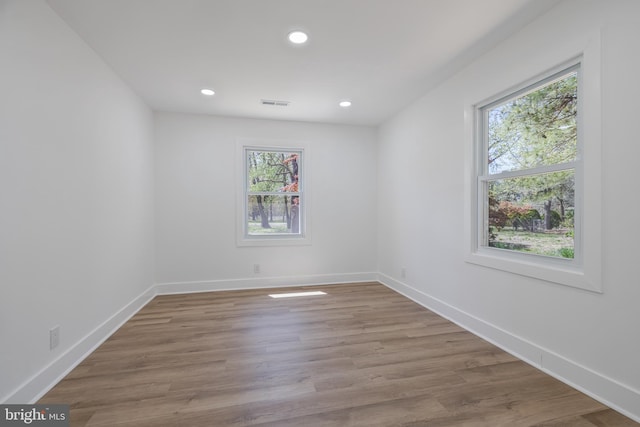 2475 W Denneys Rd, Dover, DE 19904 - spare room with baseboards, visible vents, recessed lighting, and a healthy amount of sunlight