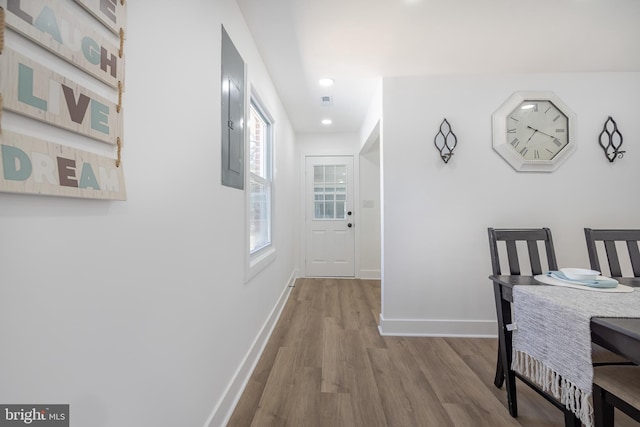 2475 W Denneys Rd, Dover, DE 19904 - hall featuring recessed lighting, wood finished floors, electric panel, and baseboards