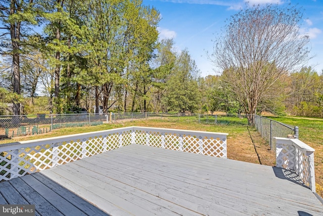 2475 W Denneys Rd, Dover, DE 19904 - wooden deck with a fenced backyard