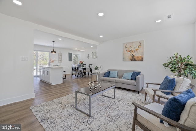 2475 W Denneys Rd, Dover, DE 19904 - living room with recessed lighting, light wood-style flooring, visible vents, and baseboards