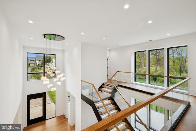 entryway featuring wood finished floors, visible vents, and recessed lighting