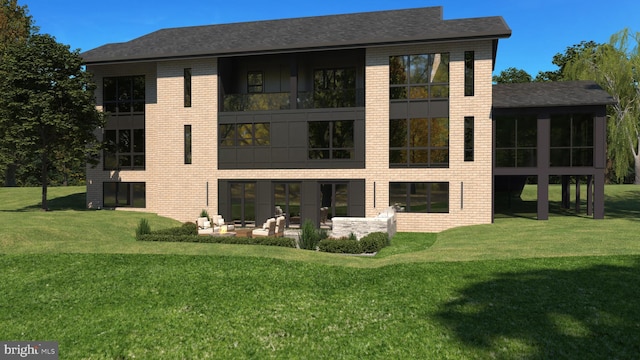 back of house featuring brick siding and a yard