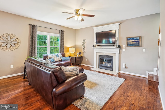12 Basket Ct, Stafford, VA 22554 - living area with ceiling fan, dark wood finished floors, a fireplace with flush hearth, and baseboards