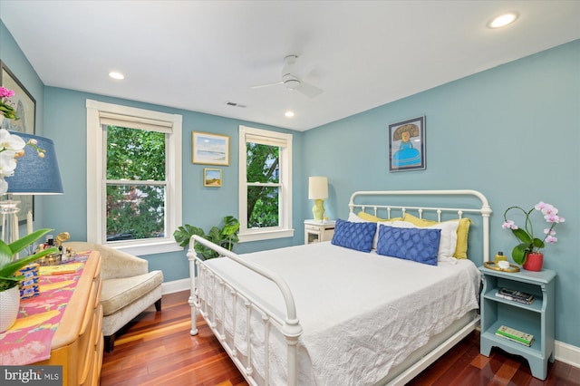 bedroom featuring ceiling fan, baseboards, dark wood-style flooring, visible vents, and recessed lighting