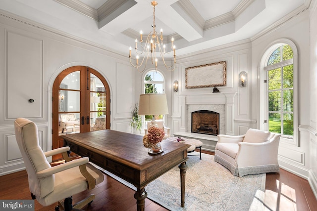 840 Childs Point Rd, Annapolis, MD 21401 - home office with a notable chandelier, a decorative wall, arched walkways, french doors, and hardwood / wood-style flooring