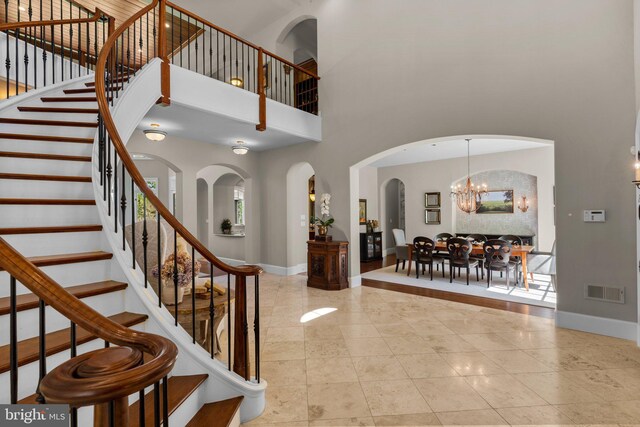 840 Childs Point Rd, Annapolis, MD 21401 - entrance foyer with baseboards, tile patterned floors, and a towering ceiling