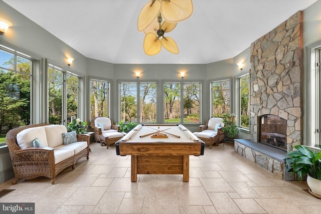 840 Childs Point Rd, Annapolis, MD 21401 - rec room featuring a wealth of natural light, vaulted ceiling, and stone tile floors