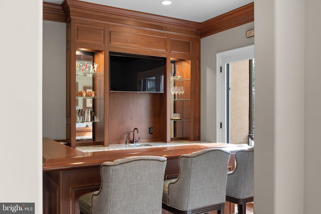 840 Childs Point Rd, Annapolis, MD 21401 - bar with indoor wet bar, a sink, and ornamental molding