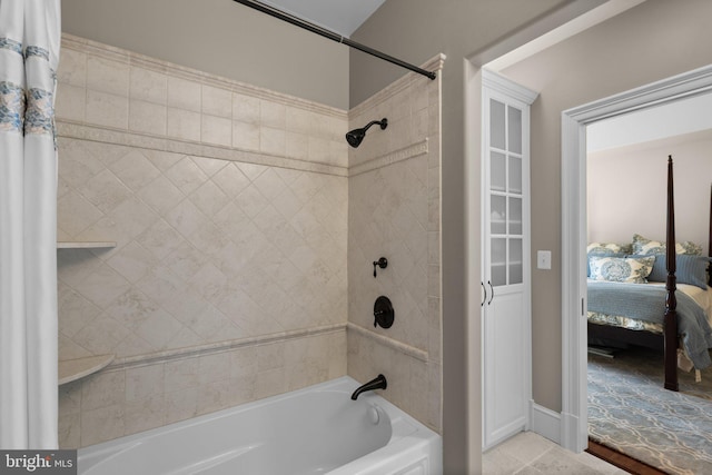 840 Childs Point Rd, Annapolis, MD 21401 - ensuite bathroom featuring shower / bath combo with shower curtain and ensuite bathroom