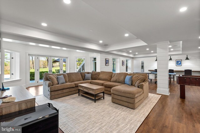 840 Childs Point Rd, Annapolis, MD 21401 - living area with crown molding, ornate columns, plenty of natural light, and wood finished floors