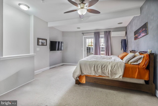 2103 Bolton St, Baltimore, MD 21217 - carpeted bedroom featuring baseboards, a ceiling fan, a wall unit AC, and access to exterior