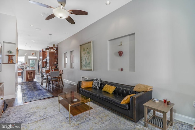2103 Bolton St, Baltimore, MD 21217 - living room with a ceiling fan, baseboards, recessed lighting, and wood finished floors