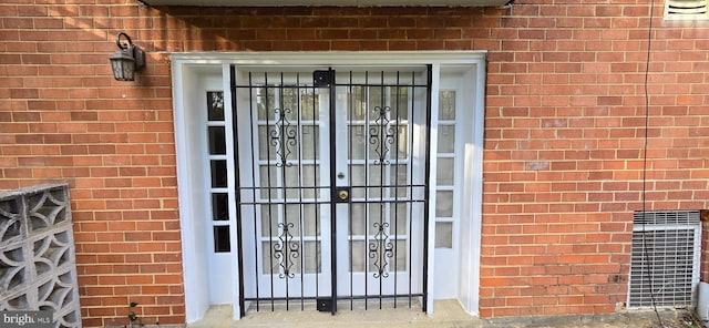 3811 Swann Rd Unit T-1, Suitland, MD 20746 - entrance to property featuring central air condition unit and brick siding
