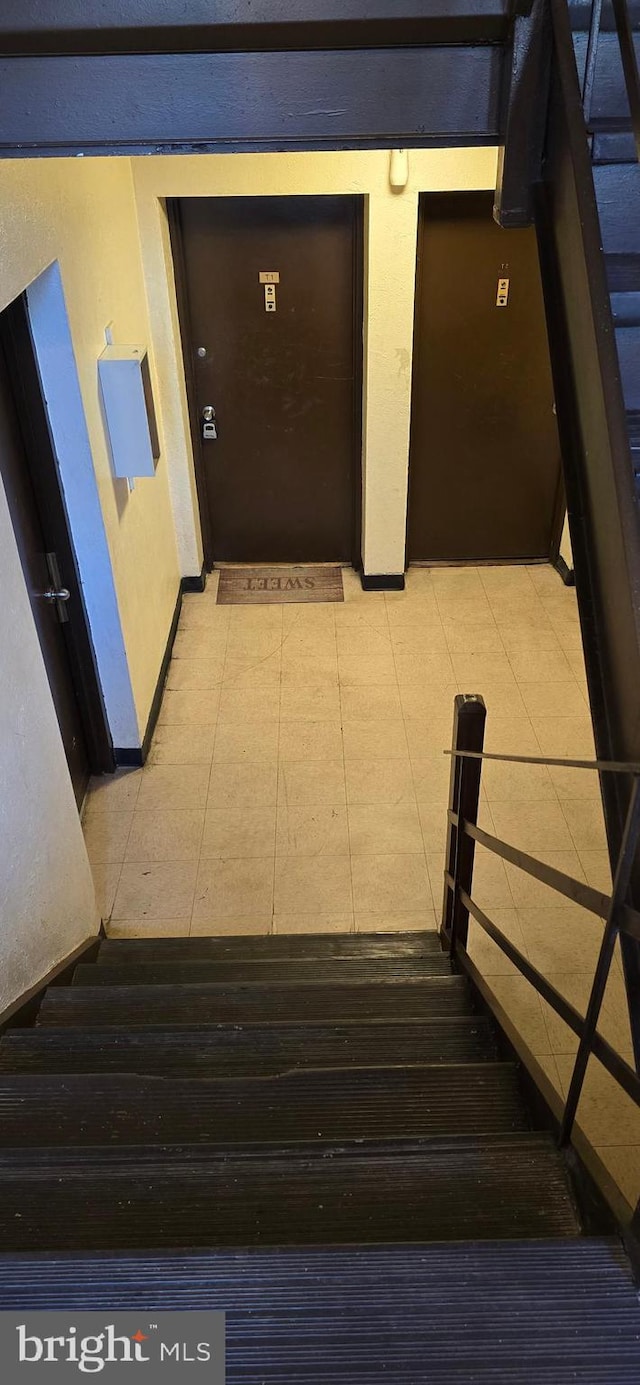 3811 Swann Rd Unit T-1, Suitland, MD 20746 - stairway featuring baseboards