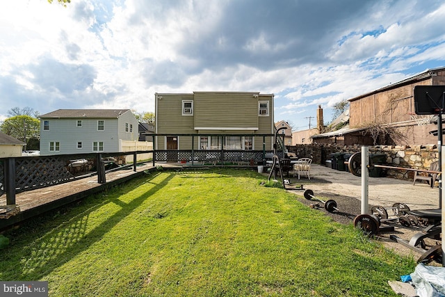 1569 Prospect Ave, Willow Grove, PA 19090 - view of yard featuring a fenced backyard and a deck