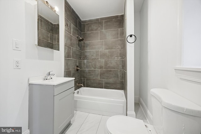 bathroom featuring toilet, baseboards, marble finish floor, vanity, and tub / shower combination