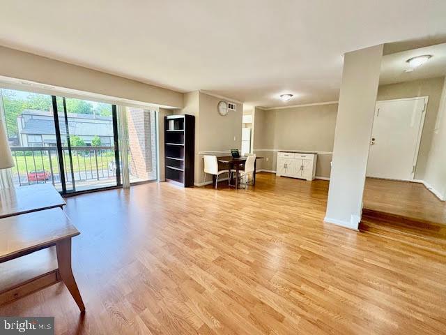 15702 Dorset Rd Unit 204, Laurel, MD 20707 - living room with light wood-style floors and baseboards