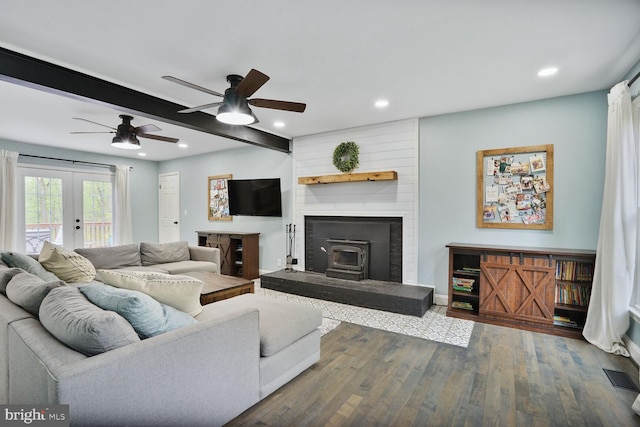 living room with ceiling fan, wood finished floors, visible vents, and recessed lighting