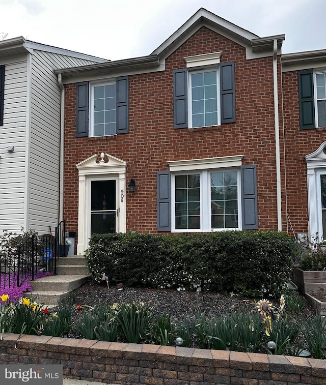 view of front of property featuring brick siding