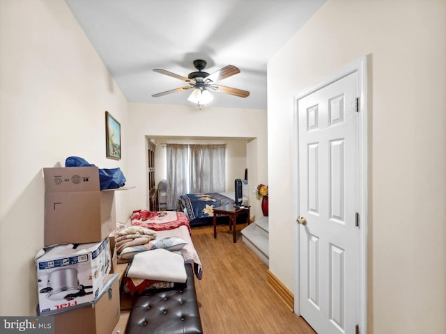 interior space featuring ceiling fan and light wood-style flooring