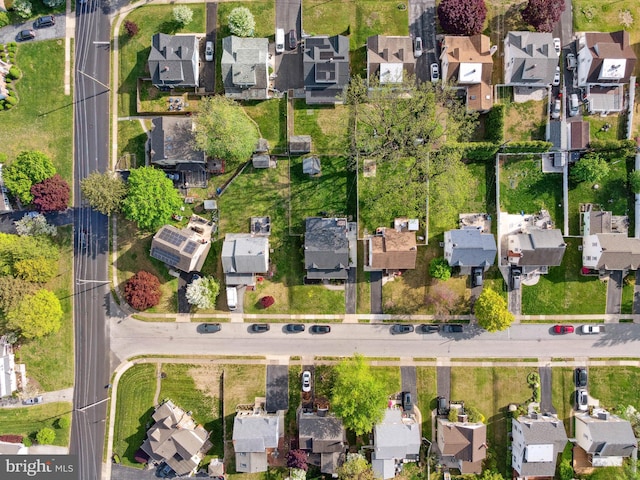 birds eye view of property with a residential view