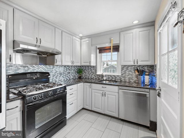 kitchen with a sink, gas stove, dishwasher, backsplash, and under cabinet range hood