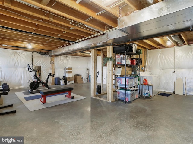unfinished below grade area with washer / dryer