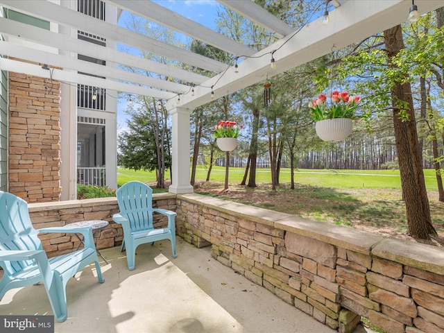 view of patio / terrace featuring a pergola