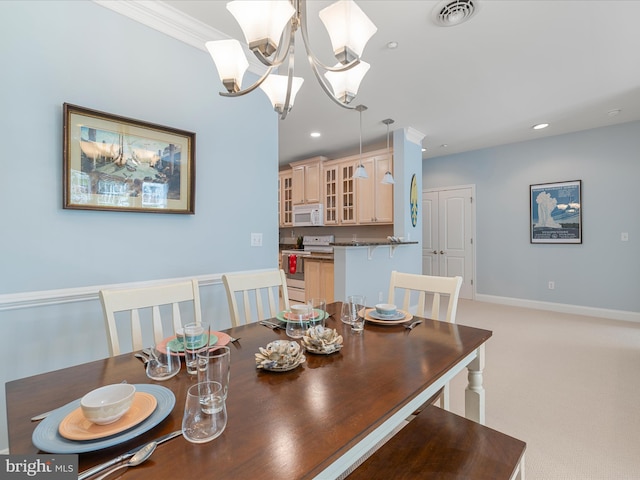 dining space featuring recessed lighting, visible vents, crown molding, and an inviting chandelier