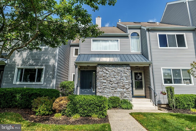 510 Chanticleer, Cherry Hill, NJ 08003 - townhome / multi-family property featuring a standing seam roof, a chimney, metal roof, and stone siding