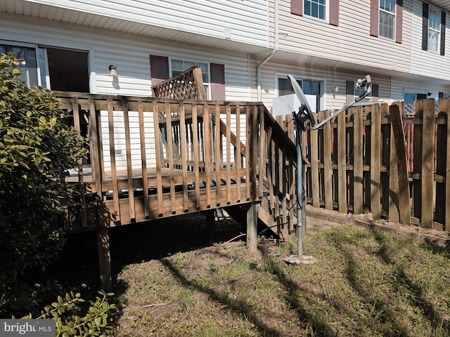 wooden deck featuring fence