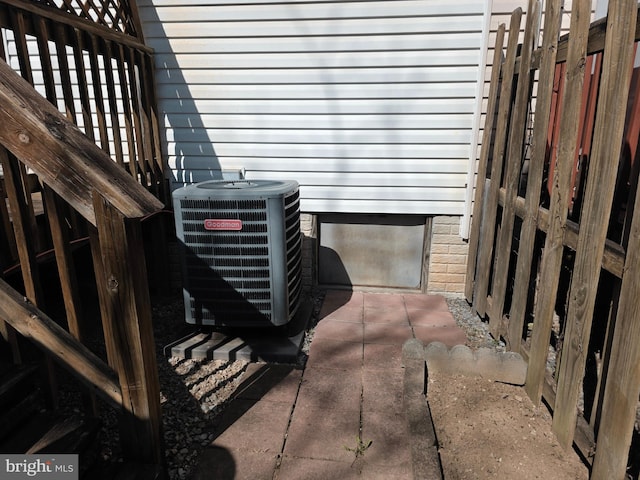 exterior details with fence and central AC