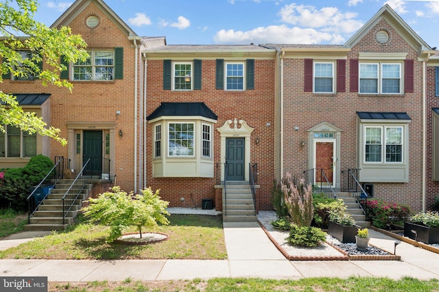 14724 Flower Hill Dr, Centreville, VA 20120 - view of property featuring brick siding and entry steps